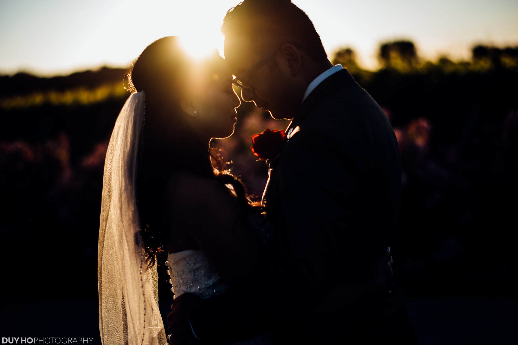 Silhouette kiss at sunset